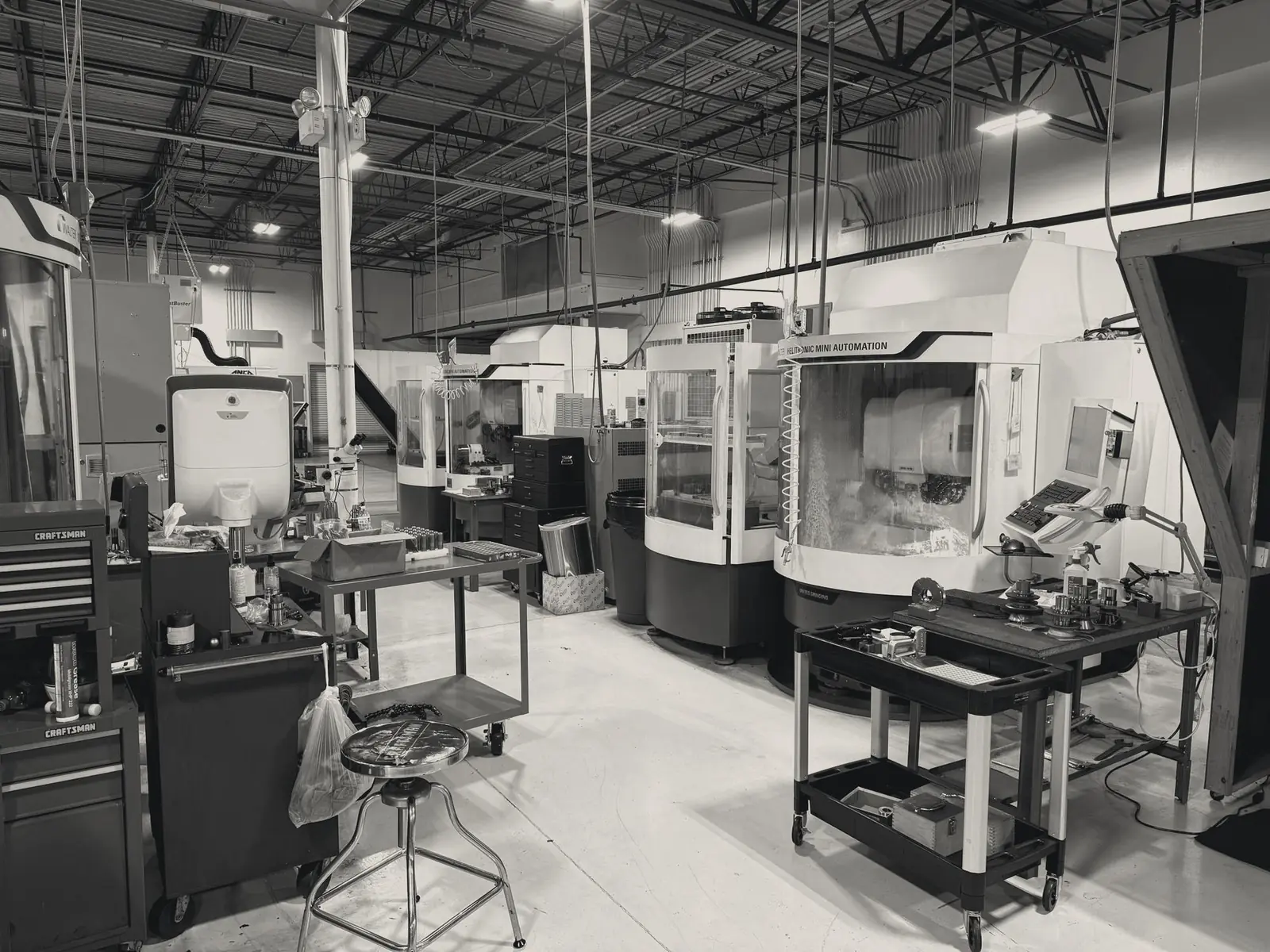 CNC machines in a bright metalworking workshop